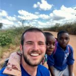 Enjoying a run accompanied by local children on their way back from school.